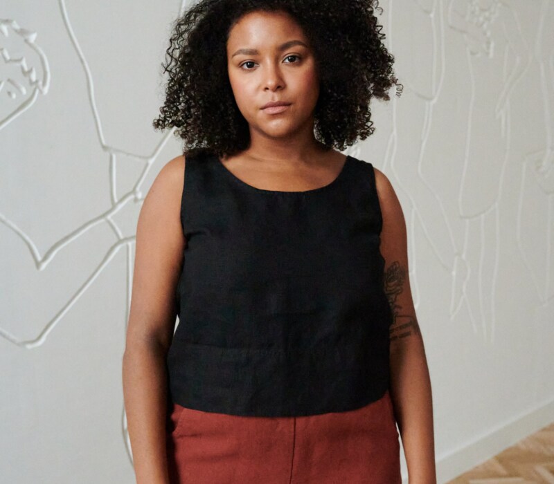 A casual sleeveless linen top with a round neckline
