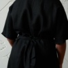 Black linen dress tied with a belt
