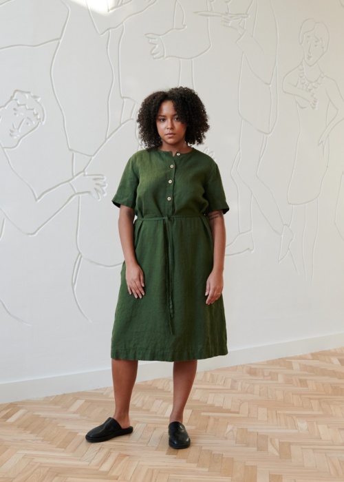 Linenfox model in deep green midi linen dress with a belt and buttons