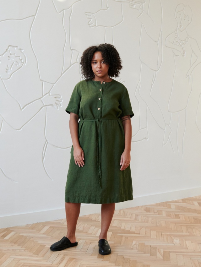 Linenfox model in deep green midi linen dress with a belt and buttons