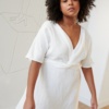 Milky white linen dress with a V-neckline and short sleeves