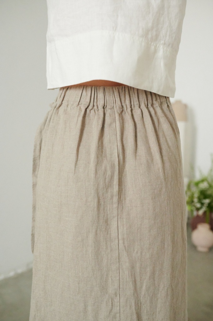 Elasticated waist of a wrap linen skirt
