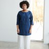 Blue tunic and white linen pants combination