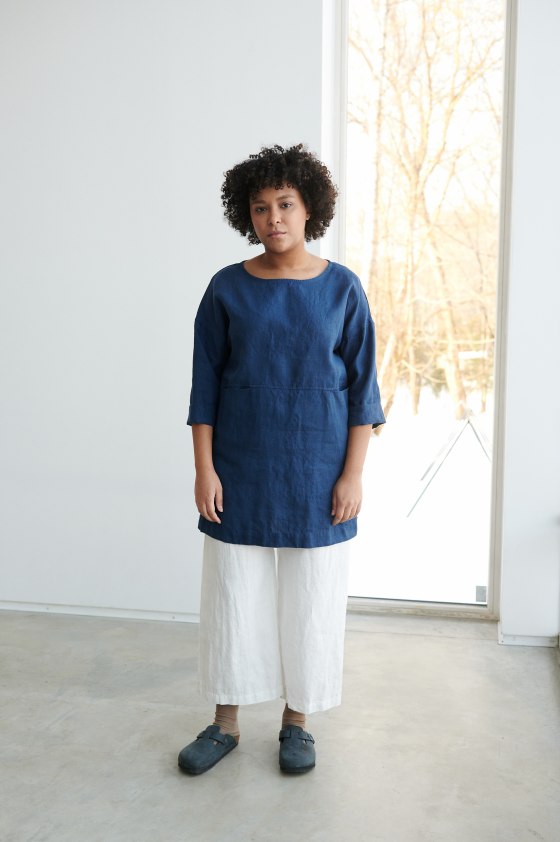 Blue tunic and white linen pants combination