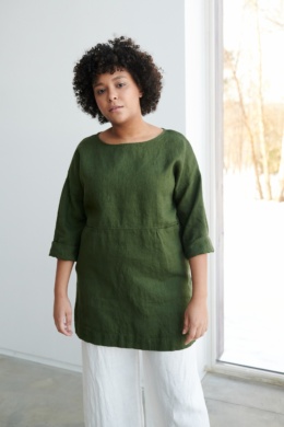 Green linen tunic with white pants combination