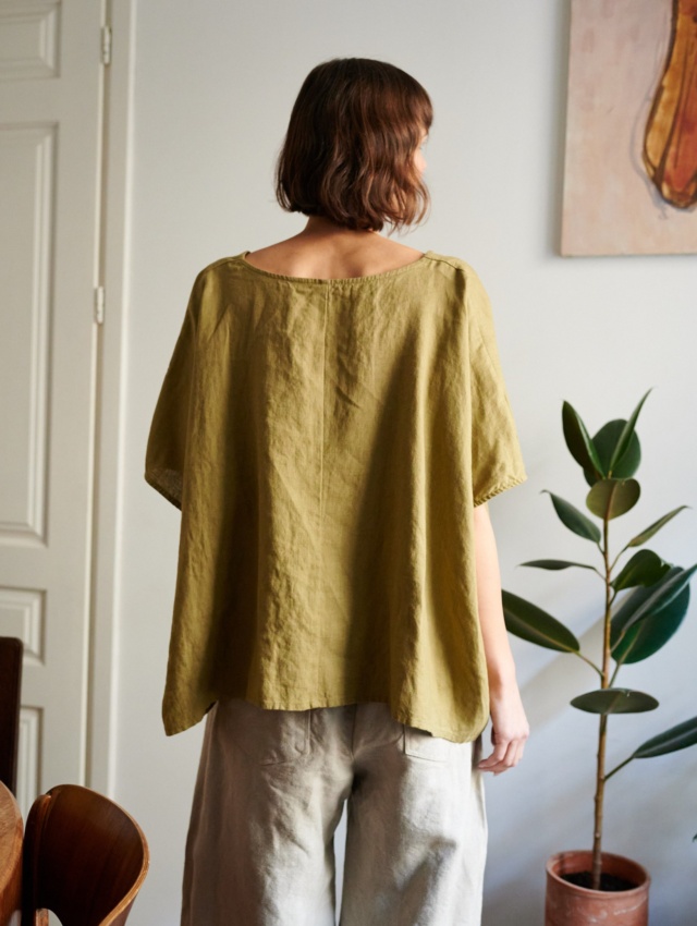 Boxy linen blouse wearing by women