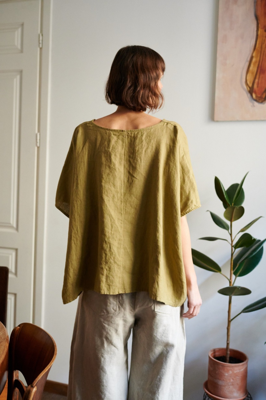 Boxy linen blouse wearing by women