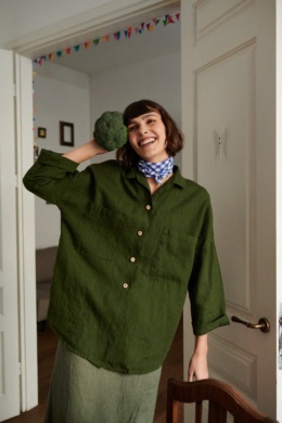 A woman in oversized linen Linenfox shirt