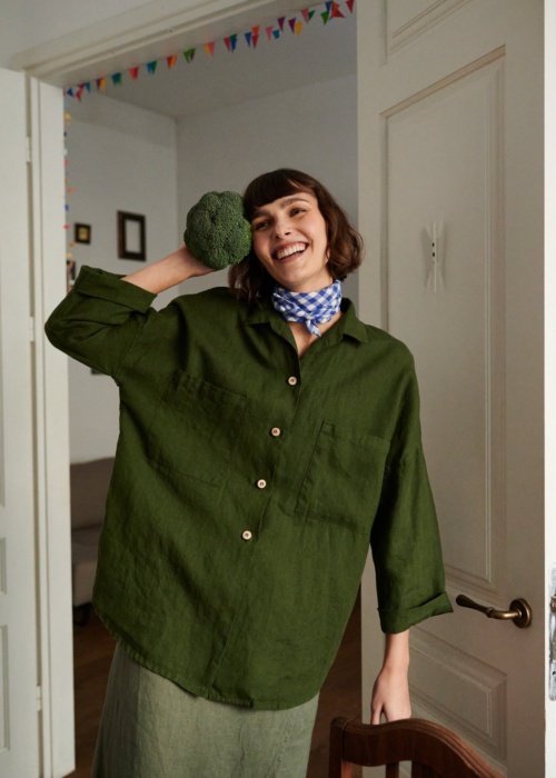 A woman in oversized linen Linenfox shirt