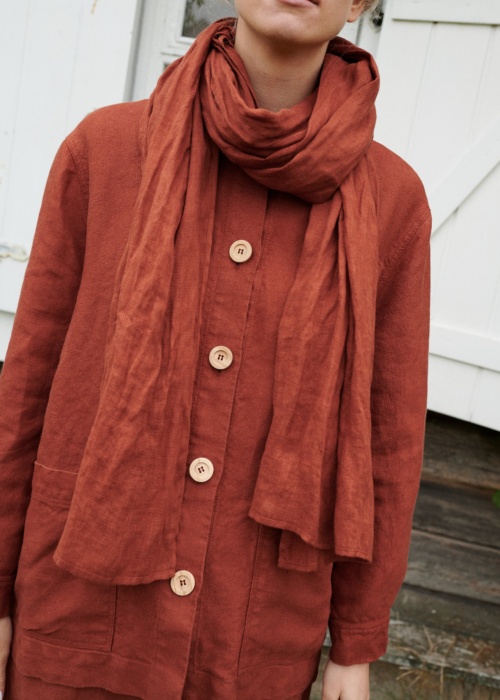 women wearing utility jacket and soft linen scarf
