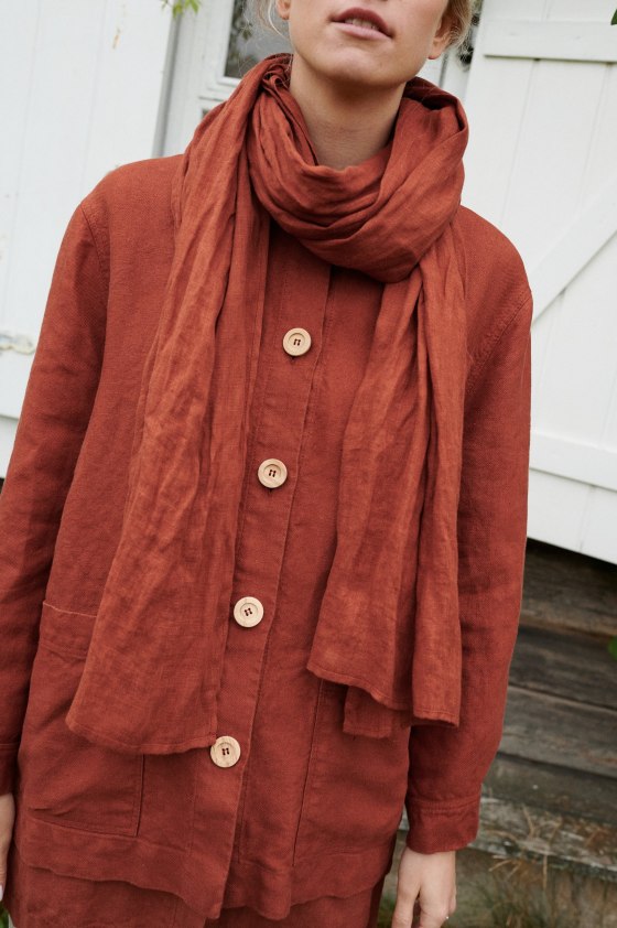 women wearing utility jacket and soft linen scarf