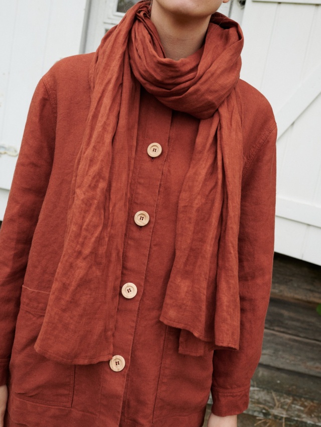 women wearing utility jacket and soft linen scarf