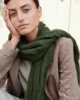 Model with heavy linen jacket and green scarf