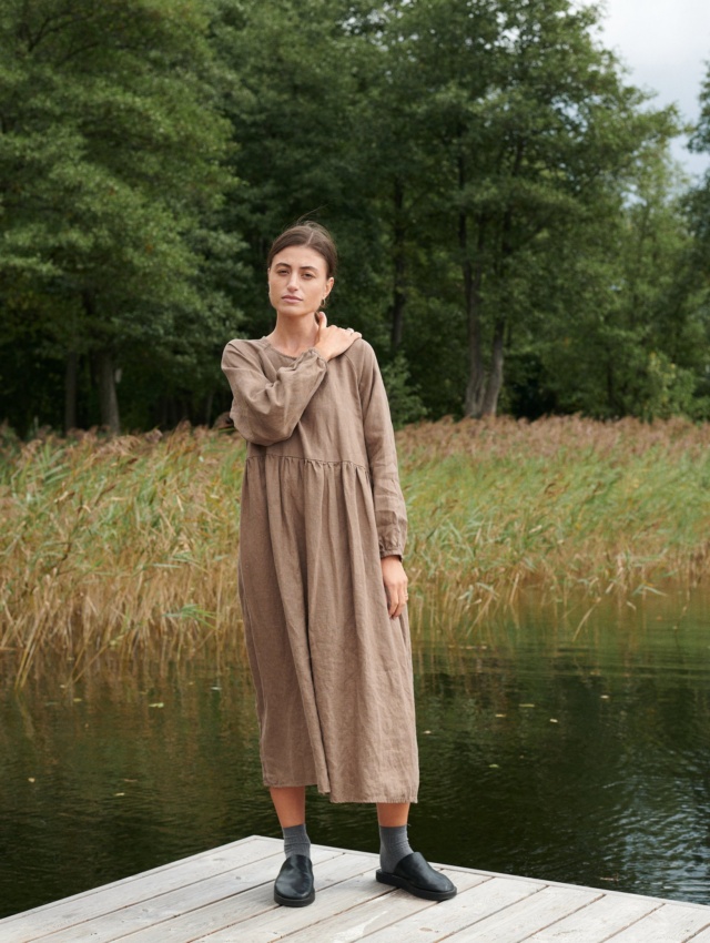 Model in oversized long sleeve linen smock dress