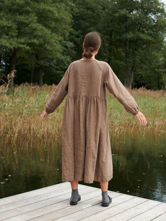 A woman wearing cacao long linen dress