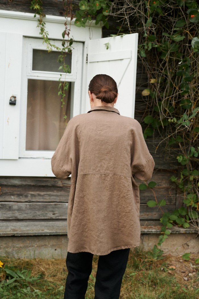 The back of a linen oversized high-low hem shirt