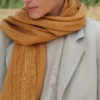 Camel linen scarf draped around the neck