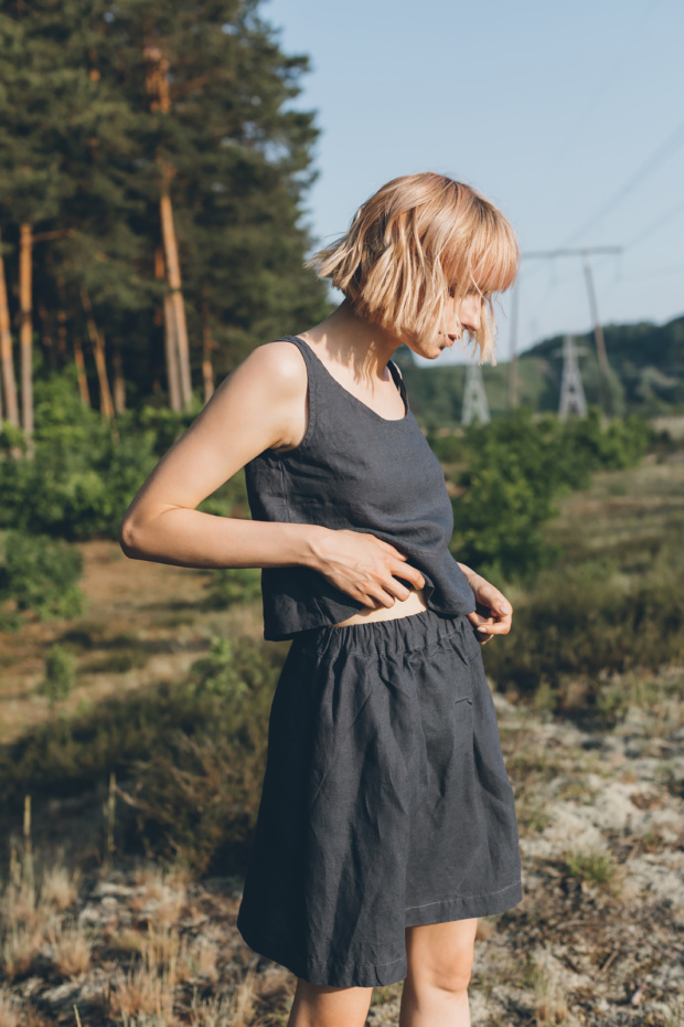 A dark grey linen mini skirt with an elasticated waistband