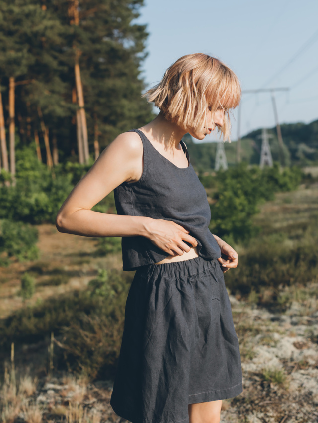 A dark grey linen mini skirt with an elasticated waistband