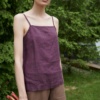 A violet straight-cut linen top with thin straps