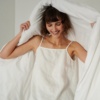 A lightweight white linen top with thin straps