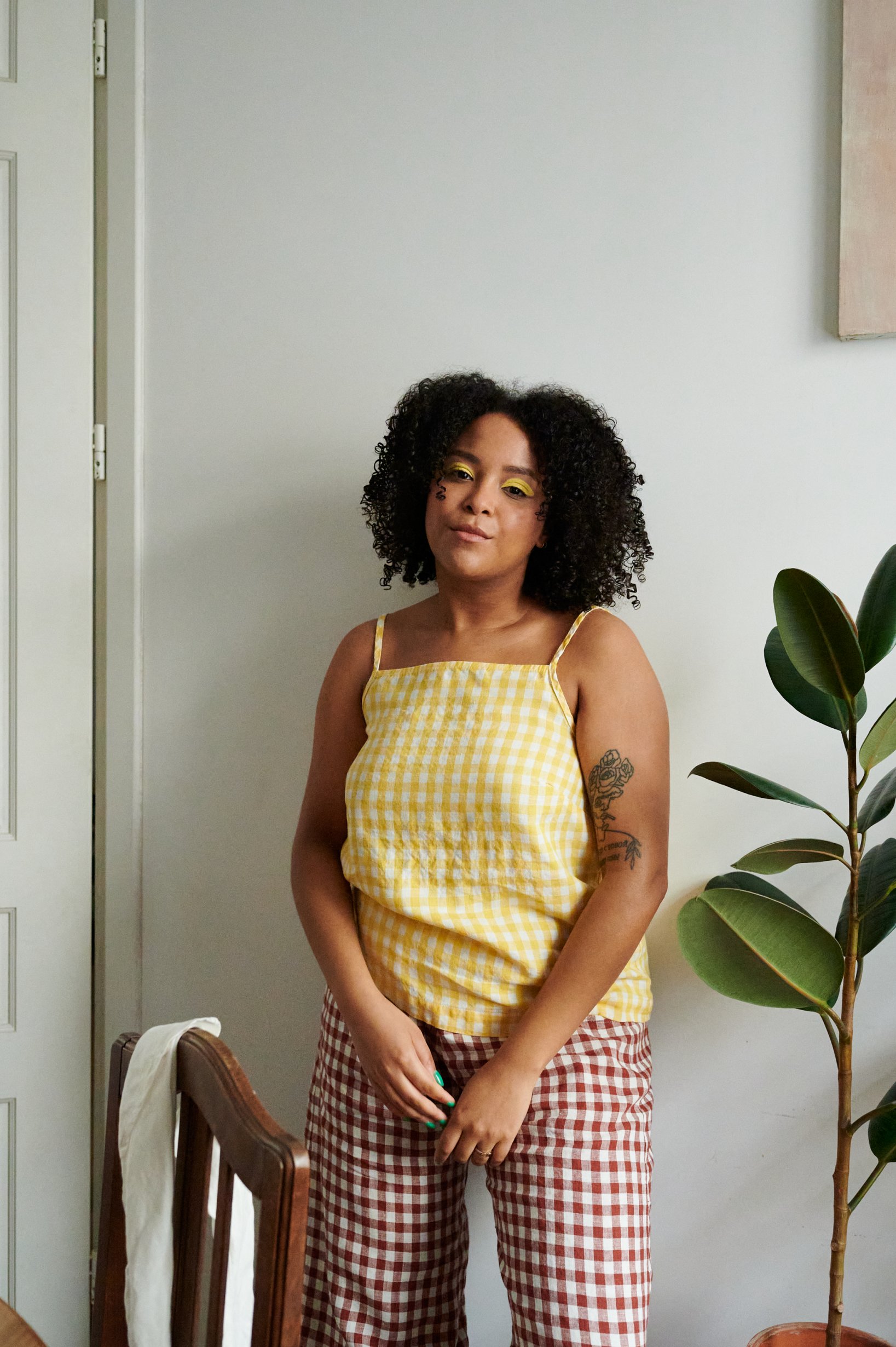A linen summer top in yellow gingham pattern