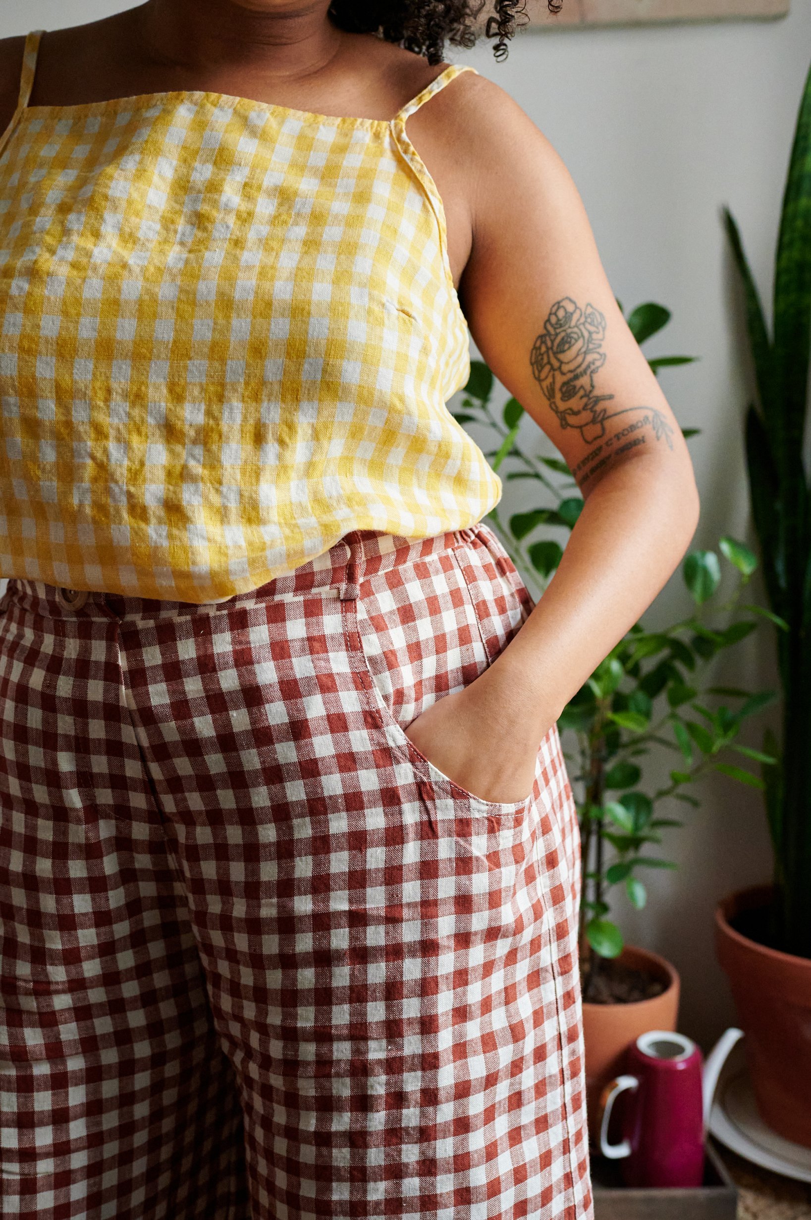 High-waisted terracotta linen pants with pockets paired with a linen summer top