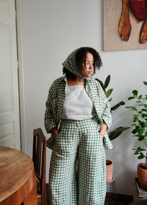 Linenfox model in green gingham button down and matching trousers