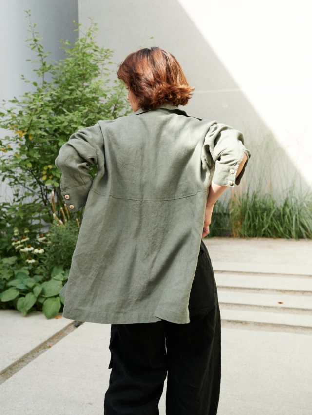 The back of pine green linen oversized button down