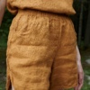 Camel color waffle linen shorts with an elasticated waist and pockets