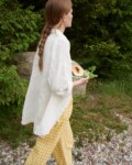 Linen white shirt with relaxed fit and wooden buttons