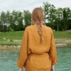 Back of a kimono-style waffle linen jacket tied with a belt