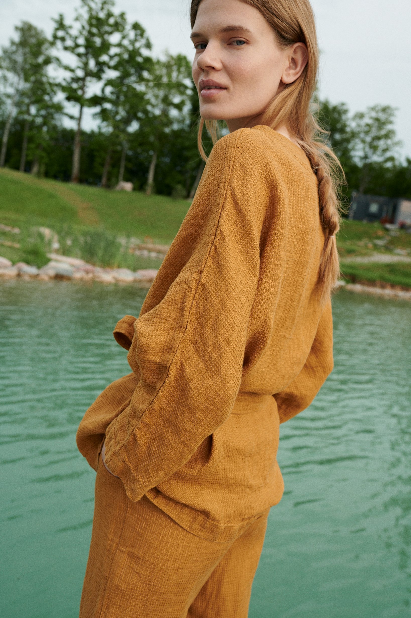 A waffle-like textured linen jacket with wide sleeves and a belt
