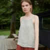 A waffle linen summer top with.a high neckline and thin straps