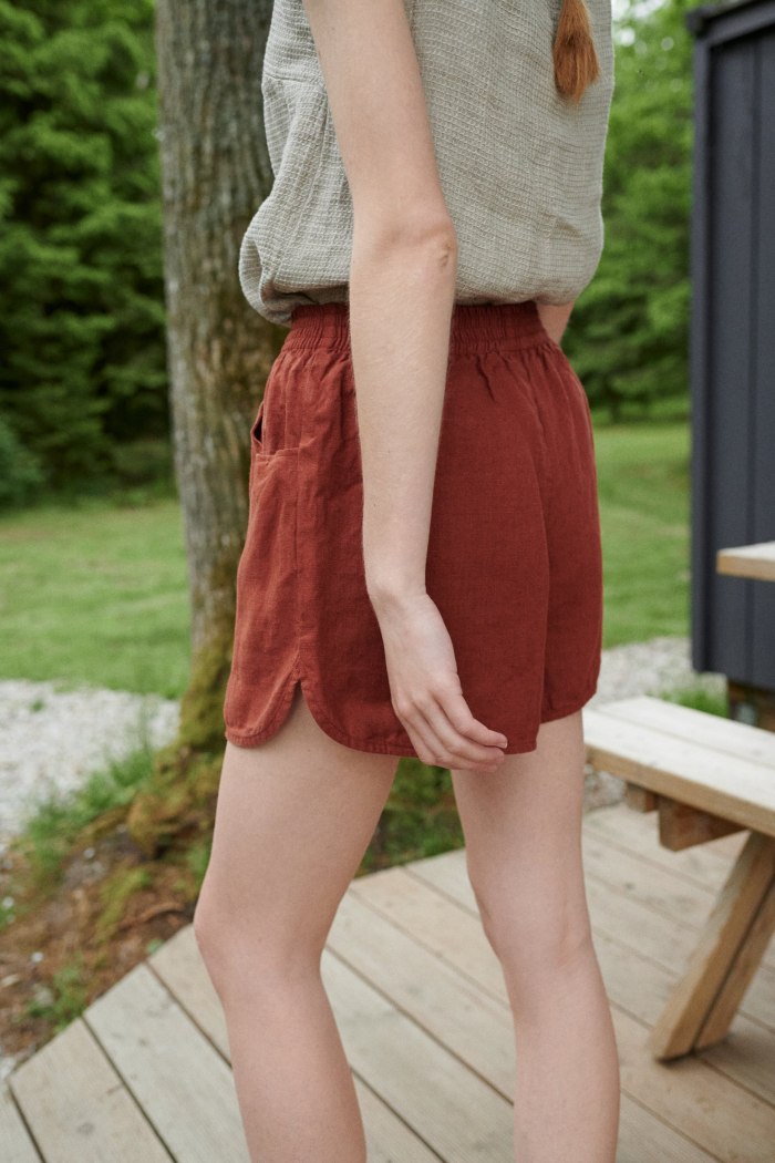 Red linen summer shorts with an elasticated waistband