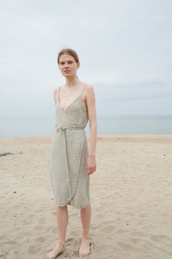 A lightweight waffle linen summer dress with a curved hem