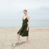 A sleeveless waffle linen wrap dress with thin straps