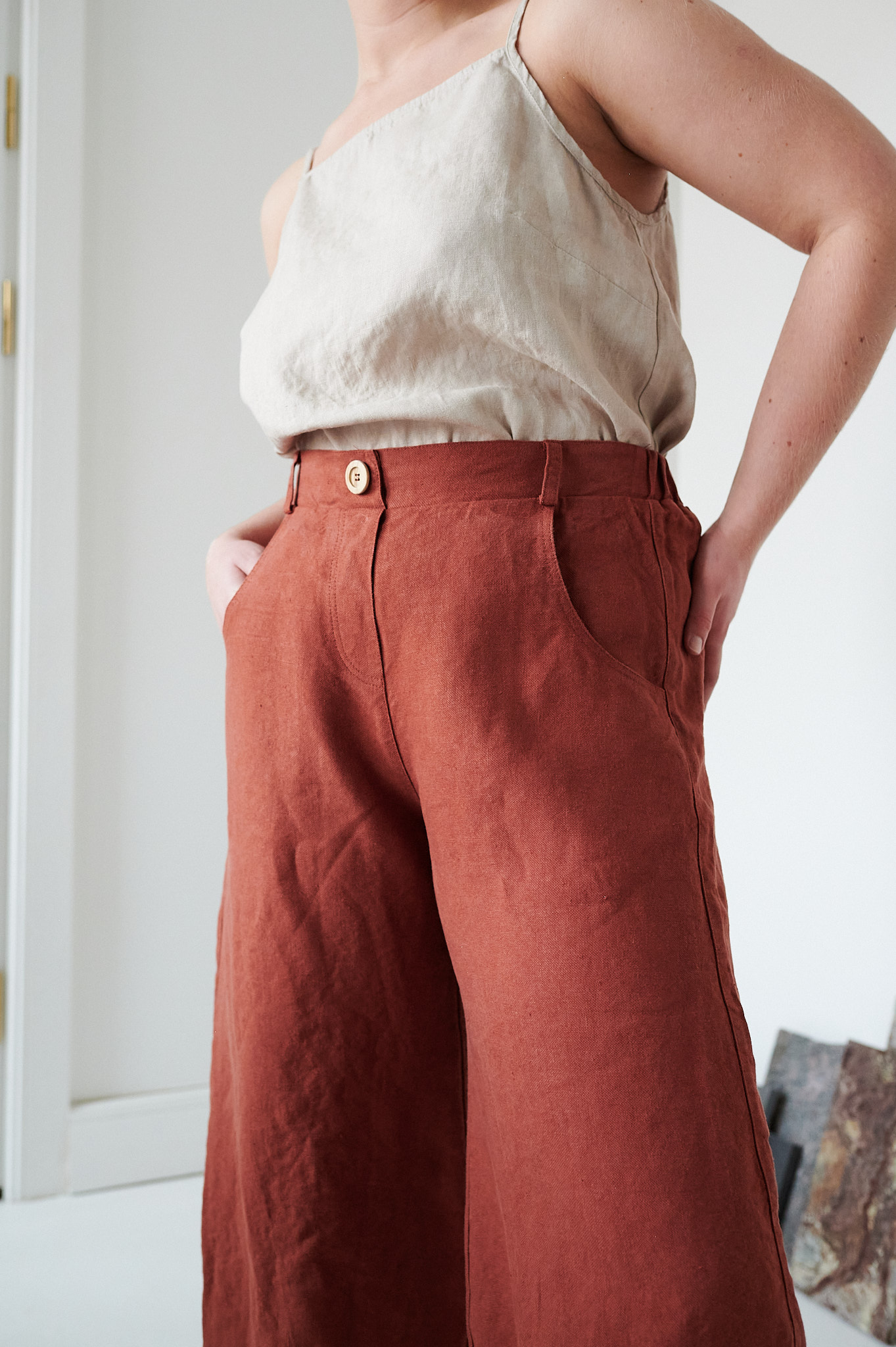 Pockets of the brown heavy linen trousers