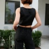 The back of high waist heavy linen black trousers