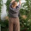 The back of linen barrel leg trousers in brown