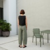 The back of heavy linen green barrel pants