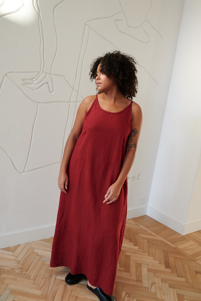 Red maxi linen dress with straps and a rounded neckline