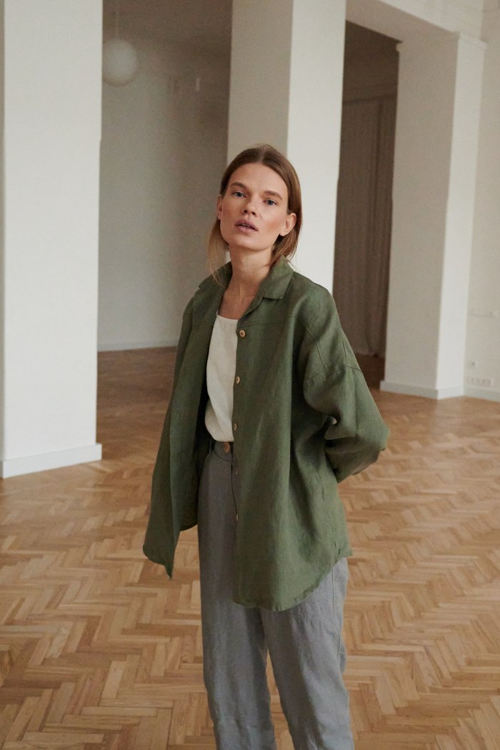 model wearing oversized linen shirt