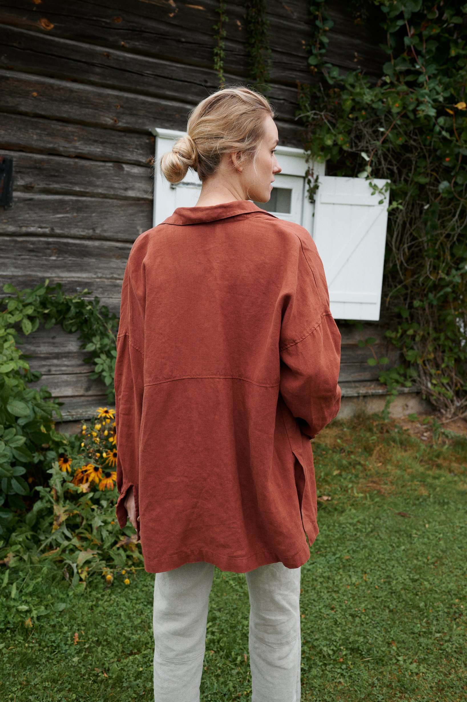Back of a relaxed fit button down linen shirt