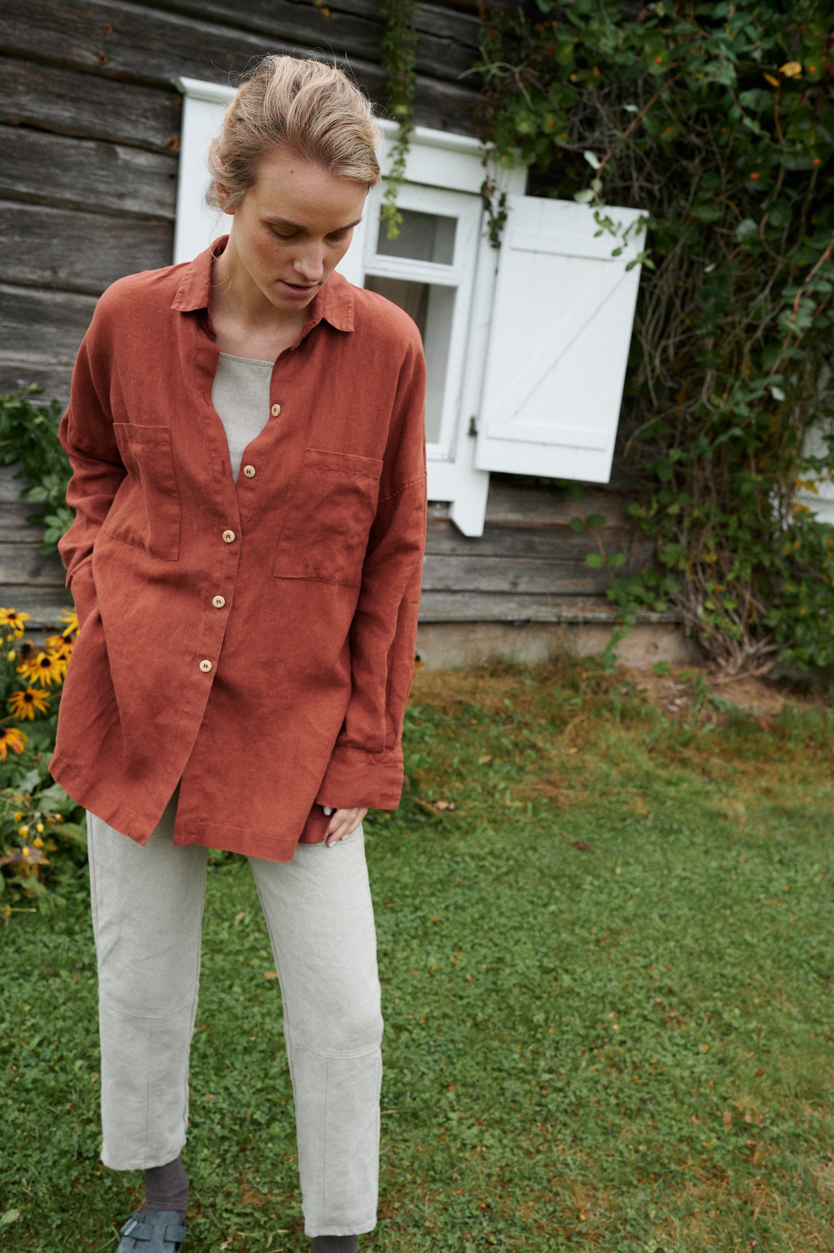 Loose-fitting terracotta linen button down shirt