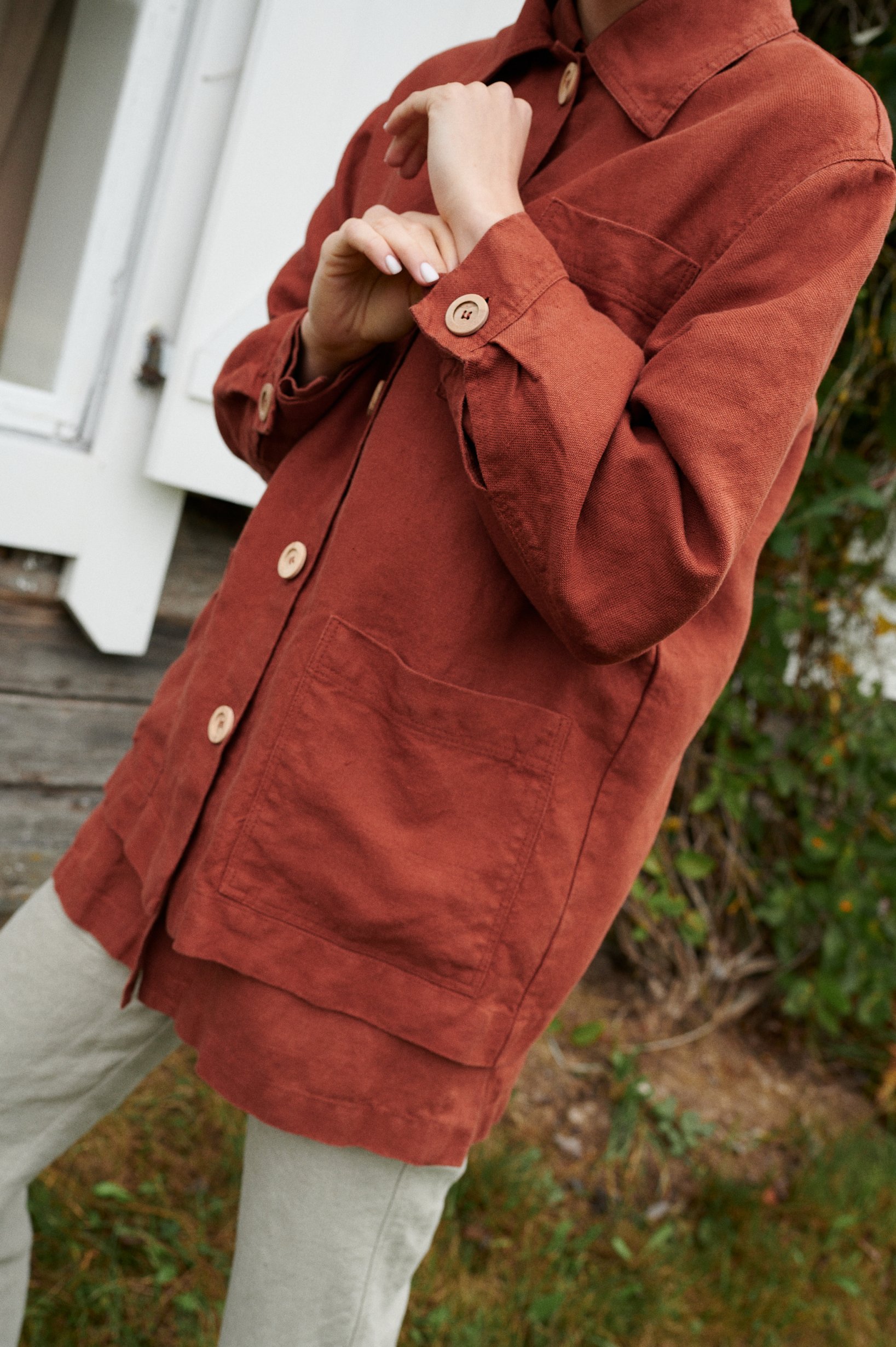 Heavy linen utility jacket with wooden buttons and patch pockets