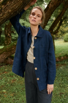Model in blue jacket and utility linen pants set