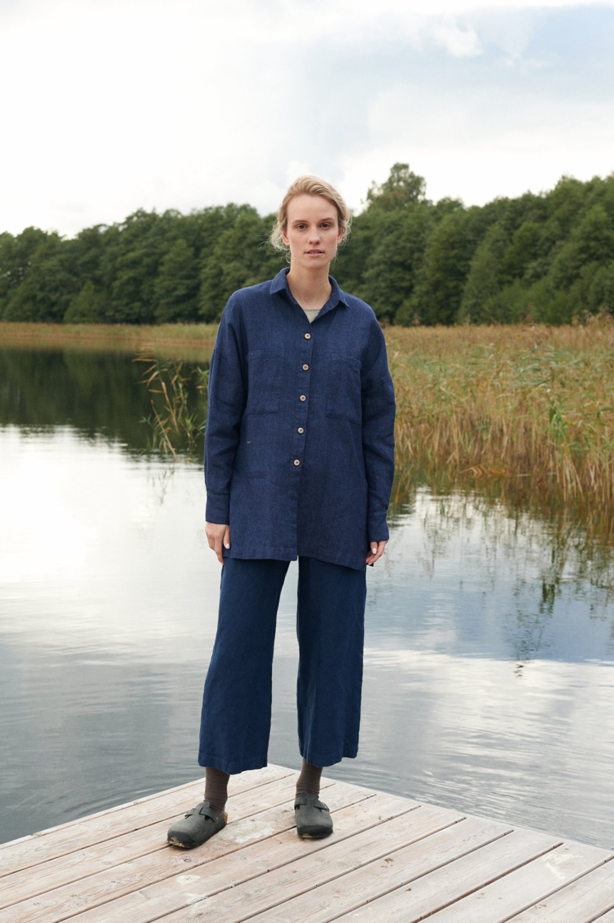 A model wearing wool blend Linenfox shirt in dark blue