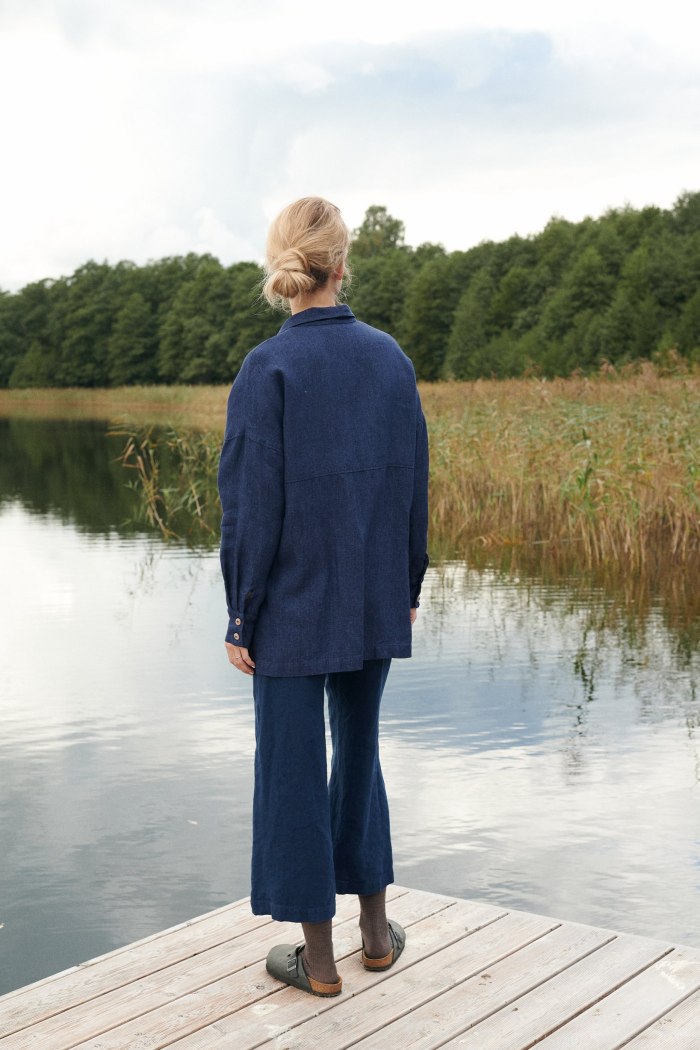 The back of dark blue linen wool blend button down shirt