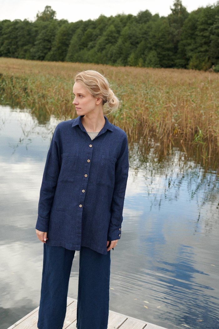 Linenfox model wearing navy blue linen wool blend shirt